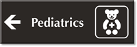 Pediatrics Engraved Sign Teddy and Left Arrow Symbol